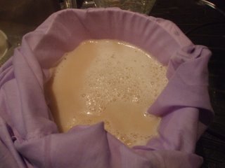 Soy bean sludge and pillowcase in the collander